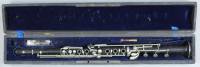African blackwood Boehm system oboe with maillechort (nickel silver) keywork, signed 